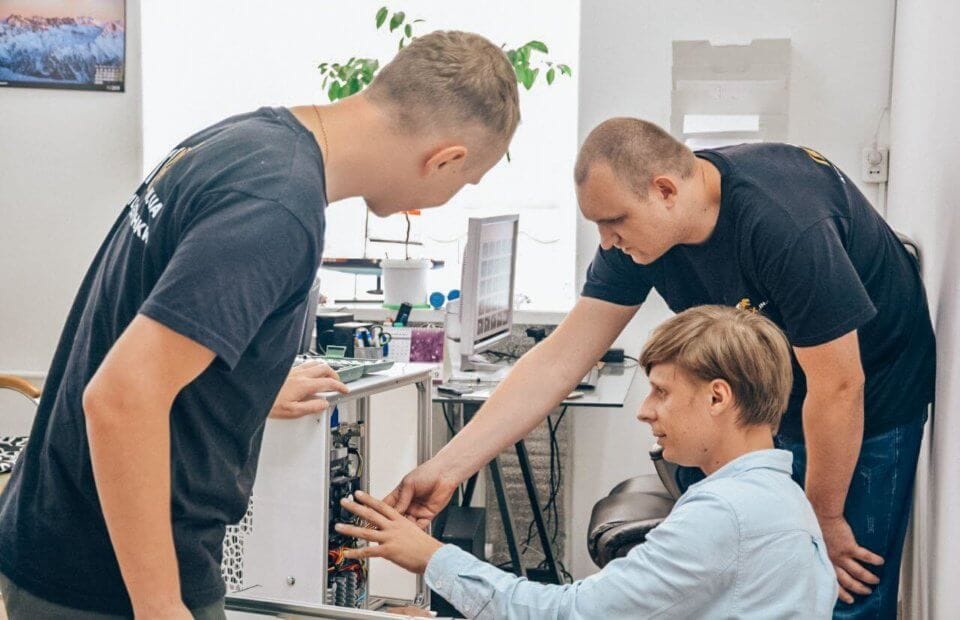 Briolight specialists working on equipment